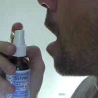 Spray Colloidal Silver in Mouth